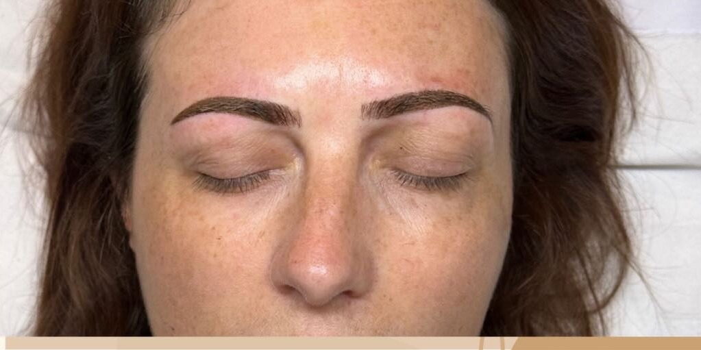 The same client after microblading and ombre brows, with fuller, defined and symmetrical brow shape